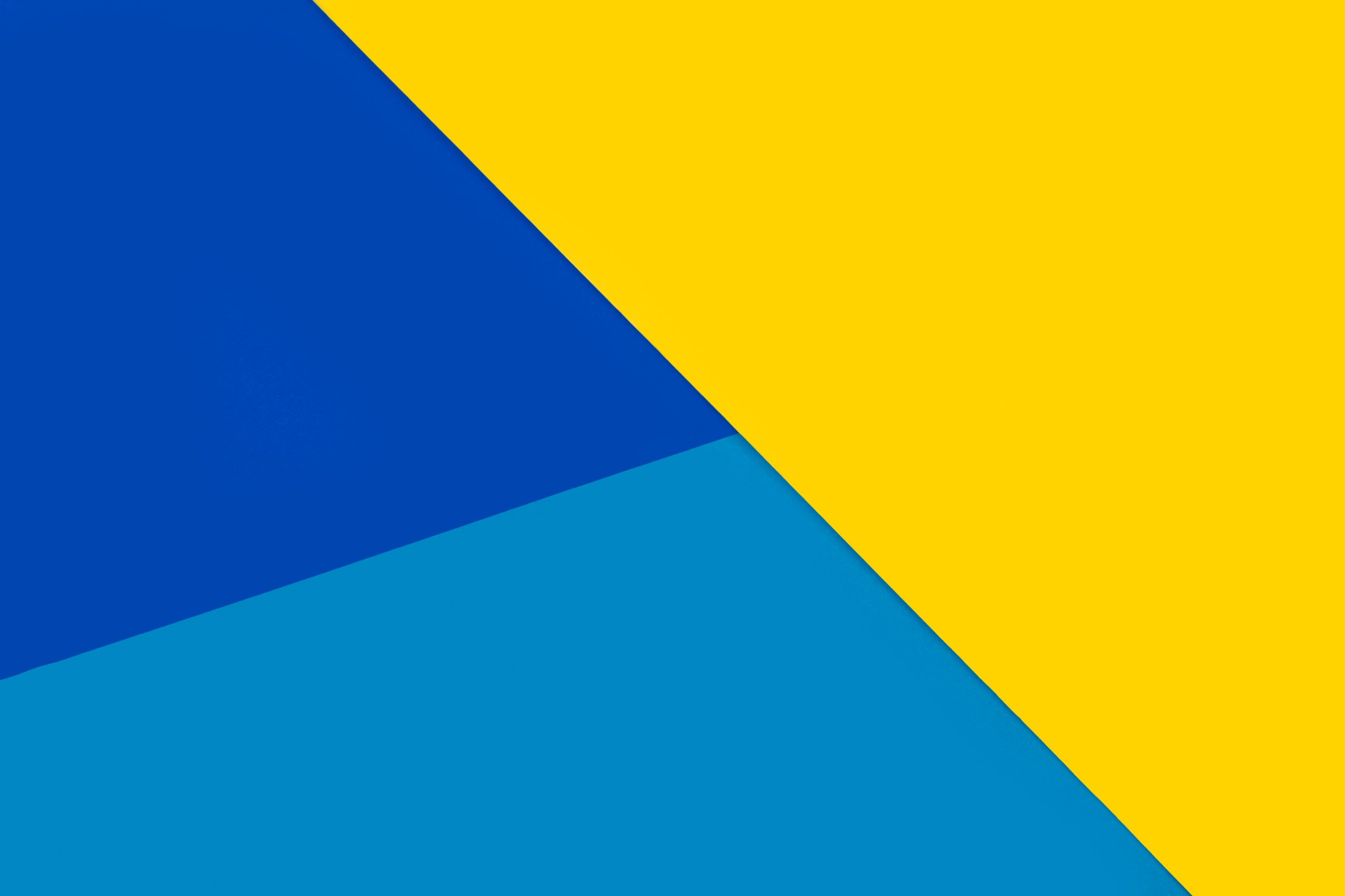 Geometric yellow and blue paper background